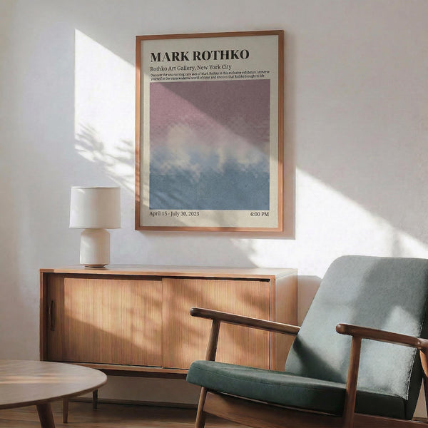 a living room with a wooden cabinet, a green armchair, and a wooden coffee table. Above the cabinet, there is a framed poster of Mark Rothko's artwork displayed on the wall.