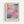May include: Framed abstract art print with soft watercolor-style blocks in pink, purple, and blue tones mounted on cream matting in light wood frame, hanging on white wall with subtle shadow