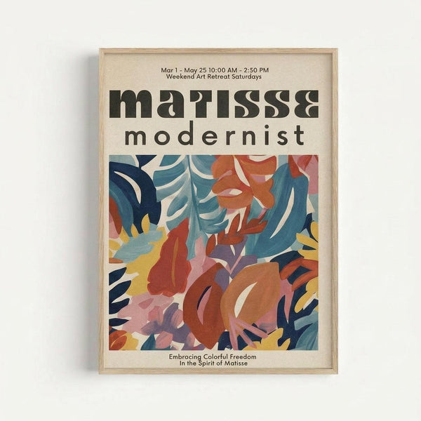 May include: Framed poster with colorful abstract botanical design in Matisse-inspired style, featuring overlapping leaves and organic shapes in blues, oranges, pinks, and yellows on cream background. Light wood frame mounted on white wall. Bold black typography at top reads "matisse modernist" with event details and tagline below the vibrant cut-out style artwork.
