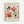 A framed vintage exhibition poster featuring Matisse's cut-out paper artwork in coral, pink, and black organic shapes resembling flowers and leaves against a cream background. The poster shows gallery information for Berggruen & Cie in Paris, dated 1958. The artwork is displayed in a thin natural wood frame against a white wall.