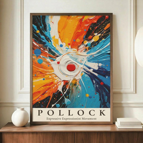 May include: Abstract expressionist poster with explosive radiating paint splatters in vibrant orange, red, blue, and white colors emanating from a central white form with red circle. Dynamic brushstrokes and paint drips create energetic movement across the composition. Framed artwork displayed on wooden credenza beside white ceramic vase and stacked books in elegant room with cream walls and classical molding.