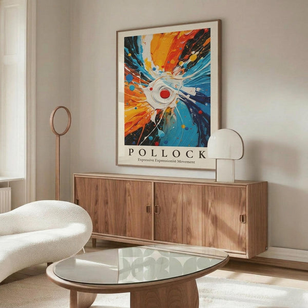 May include: Abstract expressionist artwork poster with explosive radiating design in vibrant blues, oranges, and yellows emanating from central white circle with red dot. Framed print displayed above mid-century walnut credenza in modern living room with white curved chair, glass coffee table, and minimalist brass floor lamp against neutral walls.