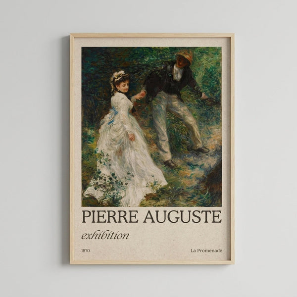 May include: Framed art print hanging on white wall showing Impressionist painting of couple walking through lush green garden. Woman wears flowing white dress with blue ribbons, man in dark jacket and hat. Soft brushstrokes create dappled light effect through foliage. Light wood frame with white matting. Text below reads "PIERRE AUGUSTE exhibition" with "1870" and "La Promenade" details.