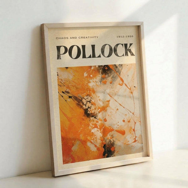 May include: Framed abstract art print leaning against white wall corner, featuring bold orange and black paint splatters in Jackson Pollock's drip painting style. Light wood frame contains cream-colored poster with "POLLOCK" in large black letters, "CHAOS AND CREATIVITY 1912-1956" subtitle, and dynamic abstract artwork below with energetic brushstrokes and paint drips in warm orange, black, and white tones.
