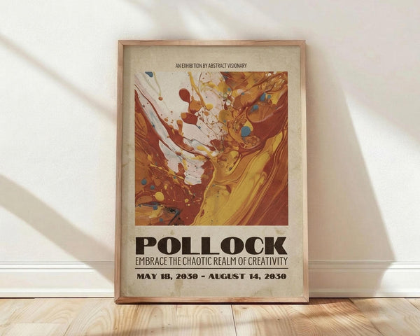 May include: A framed exhibition poster featuring abstract swirling paint in warm oranges, yellows, and browns with splattered dots in blues and reds against cream background. Bold black text reads "POLLOCK" with exhibition dates. Light wood frame leans against white wall on natural wood flooring with soft natural lighting creating diagonal shadows.