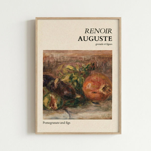 Framed art print featuring a Renoir still life painting of pomegranates and figs in warm earth tones. The artwork shows loose brushstrokes with rich oranges, greens, and browns depicting the fruit. Displayed in a light wood frame against a white wall, with "RENOIR AUGUSTE" text above the image and "grenade et figues" and "Pomegranate and figs" below in black lettering on cream background.