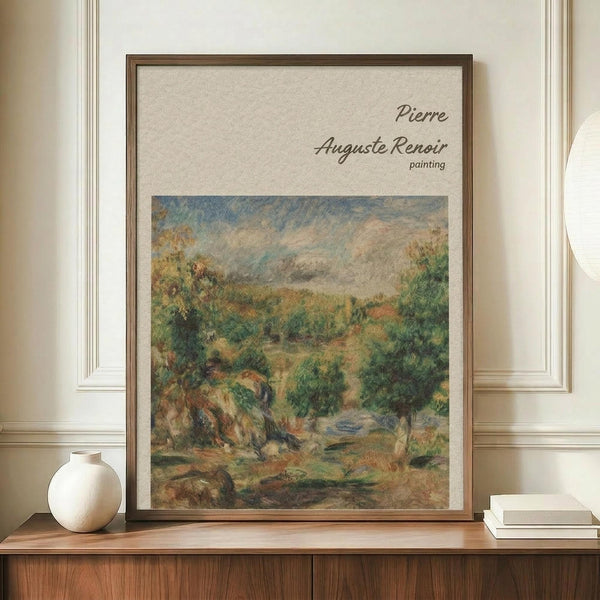 May include: Framed Impressionist landscape painting featuring rolling countryside with chestnut trees, displayed on wooden credenza beside white ceramic vase and stacked books. Warm earth tones of green, brown, and golden hues throughout the pastoral scene. Natural lighting illuminates cream colored walls with white molding in elegant interior setting.
