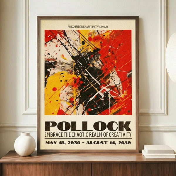 May include: Framed abstract art poster with vibrant red, yellow, and black paint splatters and dynamic brushstrokes displayed on wooden sideboard next to white ceramic vase and stacked books against cream paneled wall. Exhibition-style poster features bold typography announcing Pollock exhibition dates with energetic drip painting artwork above text.
