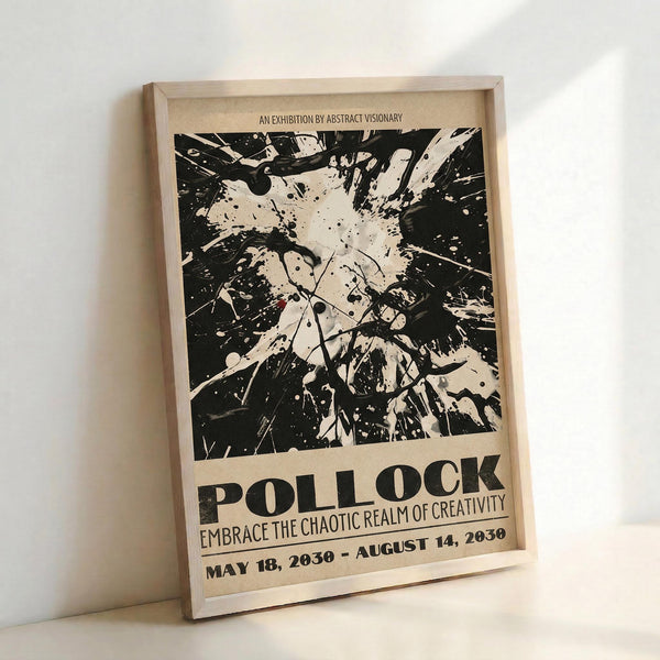 May include: A framed art poster leaning against a white wall. The poster features a black and white abstract paint splatter design reminiscent of Jackson Pollock's drip painting style, with chaotic splatters and streaks across a cream background. Text at the top reads "AN EXHIBITION BY ABSTRACT VISIONARY" and below the artwork shows "POLLOCK" in large bold letters, followed by "EMBRACE THE CHAOTIC REALM OF CREATIVITY" and exhibition dates. The poster is displayed in a ligh
