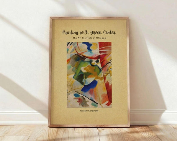 May include: Framed abstract art poster with vibrant swirling colors including green, red, blue, yellow and orange brushstrokes on cream background, displayed in light wood frame leaning against white wall on wooden floor with natural window lighting creating soft shadows