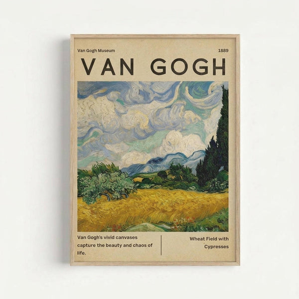 Framed museum poster featuring Van Gogh's Wheat Field with Cypresses painting, showing swirling blue and white clouds above golden wheat fields and dark green cypress trees. The beige poster includes "VAN GOGH" in large black letters, "Van Gogh Museum 1889" at top, and descriptive text about the artist's vivid canvases capturing life's beauty and chaos. Light wood frame against white wall.