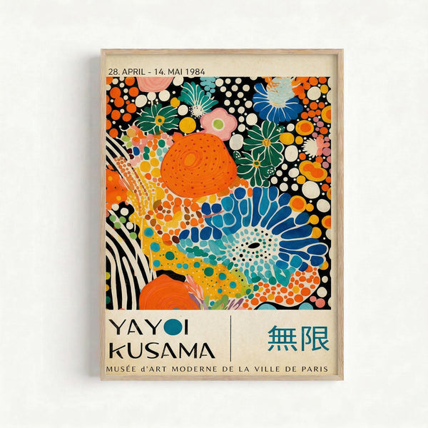 Framed exhibition poster featuring vibrant abstract artwork with colorful polka dots, organic shapes, and floral motifs in orange, blue, green, pink, and black. The composition includes large orange circular forms, stylized flowers, and scattered dots against a black background. Text shows dates "28. APRIL - 14. MAI 1984" at top, artist name "YAYOI KUSAMA" at bottom left, Japanese characters on right, and "MUSÉE d'ART MODERNE DE LA VILLE DE PARIS" below. Light wood frame ag
