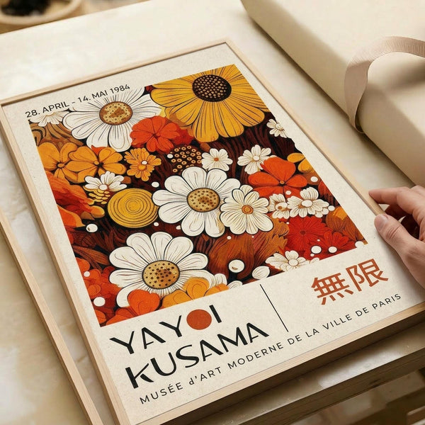 A framed poster advertising an art exhibition titled "Yayoi Kusama" at the Museum d'Arts in Paris, dated April 28, 1984.