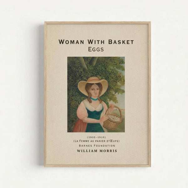 Framed art print showing a woman in period dress with white bonnet, green bodice, and white blouse holding a wicker basket of eggs under leafy trees. The vintage-style illustration is displayed in a light wood frame against a cream mat with black text reading "WOMAN WITH BASKET EGGS" and attribution information below. The frame casts a subtle shadow on the white wall background.