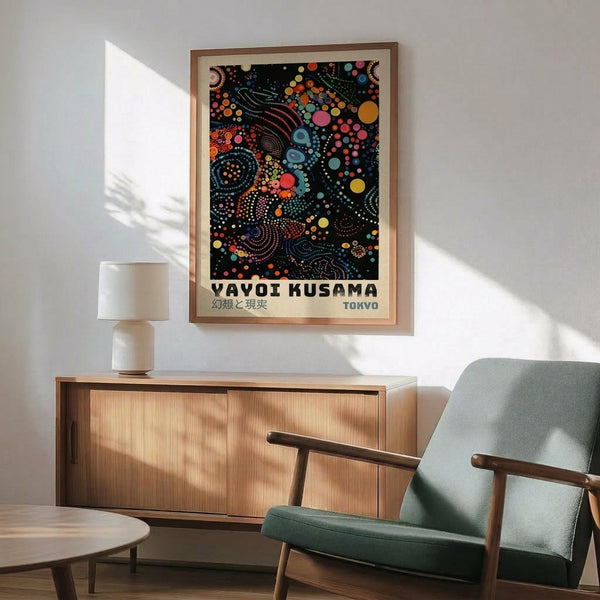a poster of the Vavoi Husama exhibition in Tokyo, with a wooden cabinet and a green armchair in the foreground.
