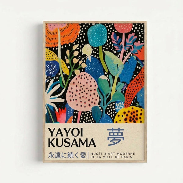 Colorful abstract art poster in light wood frame featuring vibrant floral and organic shapes with polka dot patterns on black background. Artwork displays blues, oranges, pinks, yellows, and greens in a contemporary botanical style. Text below includes "YAYOI KUSAMA" and Japanese characters, along with "MUSÉE d'ART MODERNE DE LA VILLE DE PARIS" in smaller print on cream-colored bottom section.