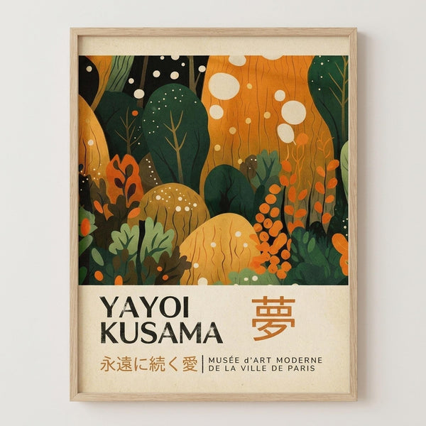 May include: Framed art print displayed on white wall featuring abstract botanical illustration with stylized mushrooms, coral, and underwater plants in orange, green, and cream colors with white dots scattered throughout. Text below artwork shows "YAYOI KUSAMA" in black letters with Japanese characters and "MUSÉE D'ART MODERNE DE LA VILLE DE PARIS" subtitle. Light wood frame against neutral background.