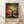May include: Framed poster print featuring a vibrant tree silhouette against a cosmic background of colorful dots and circles in rainbow hues. The artwork shows detailed roots and branches with Japanese text below. The print is displayed in a natural wood frame, leaning against a white wall on light wooden flooring with soft shadows.