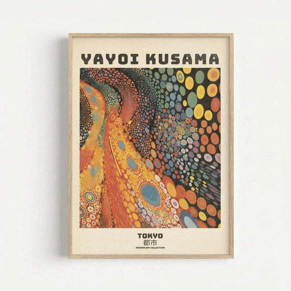 Framed art print featuring Yayoi Kusama's signature polka dot style with flowing organic shapes in vibrant oranges, yellows, and blues transitioning to darker tones with multicolored circular patterns. The artwork shows characteristic infinity net motifs with densely packed dots of varying sizes. Text reads "YAYOI KUSAMA" at top and "TOKYO" with Japanese characters below. Light wood frame against white wall background.