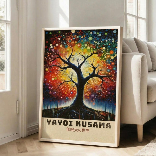 May include: Framed art print leaning against white wall next to beige sofa in bright room with large windows. The poster features a vibrant tree with black silhouette trunk and branches, surrounded by colorful dots in rainbow hues of red, orange, yellow, green, blue creating a dreamy, cosmic atmosphere. Text appears below the artwork in both English and Japanese characters. Natural lighting creates soft shadows on hardwood flooring.