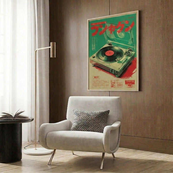 May include: Vintage Japanese turntable poster with green and red retro design featuring record player illustration, displayed in light wood frame on brown wood panel wall above beige upholstered armchair with geometric patterned pillow, modern brass floor lamp and side table with open book nearby