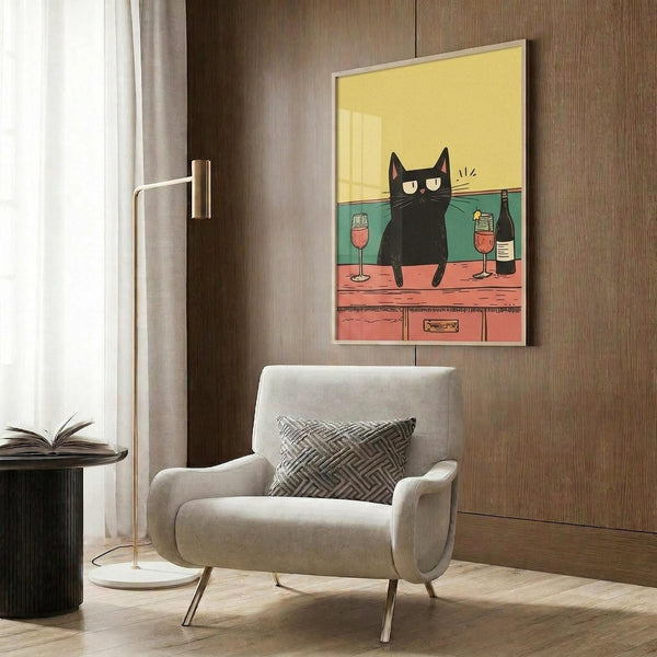 May include: Framed poster showing a grumpy black cat sitting on a coral-pink bar counter with wine glasses and bottle, against yellow and teal background. Modern living room mockup with beige armchair, geometric pillow, brass floor lamp, and dark wood wall paneling.