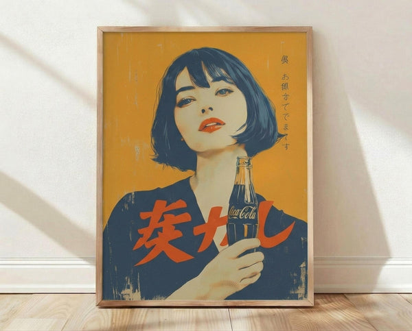 May include: Framed vintage-style Japanese Coca-Cola advertisement poster with yellow-orange background featuring woman with black bob haircut holding classic Coke bottle, displayed against white wall on wooden floor. Red Japanese characters overlay the blue-toned illustration in retro pop art style with weathered texture effects.