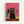 Whimsical illustration of cats wearing sunglasses standing on a wooden fence against a coral pink background. Features a prominent black cat in the center with yellow sunglasses and collar, surrounded by smaller cats in various colors including pink, teal, and black, all wearing teal sunglasses. Art style is modern and playful with bold colors and simple shapes. Displayed in a light wood frame on white wall.