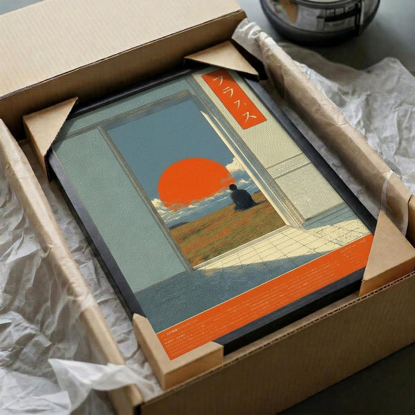 May include: Framed art print in cardboard shipping box with protective padding. Artwork shows Japanese-inspired scene with large red sun, silhouette of person sitting on hillside overlooking water, viewed through traditional sliding doors or window frame. Muted teal, orange, and cream color palette with geometric architectural elements and tatami mat flooring visible in foreground.