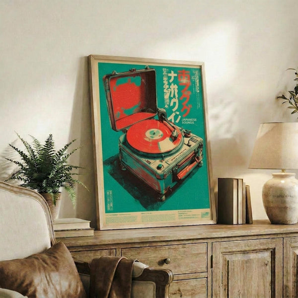 May include: Framed vintage-style poster with turquoise background featuring illustrated record player and Japanese text, displayed on rustic wooden sideboard alongside fern plant, ceramic vase, and stacked books in neutral-toned living room setting