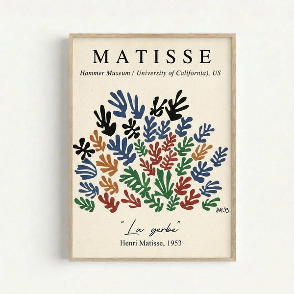 Framed poster print featuring Henri Matisse's colorful cut-out style artwork with organic leaf and coral-like shapes in blue, green, red, orange, and black arranged in a bouquet formation. Museum attribution text at top, artwork title "La gerbe" and "Henri Matisse, 1953" at bottom. Light wood frame against white background with soft shadow.