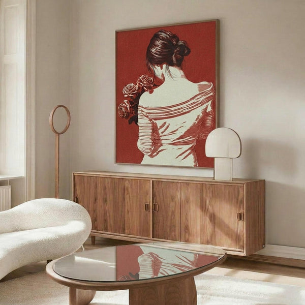 May include: Red and white art print showing woman in draped clothing holding roses, displayed above wooden credenza in modern living room with white curved chair, glass coffee table, and floor lamp