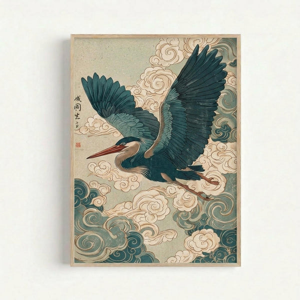 Japanese-style artwork depicting a large blue-green heron in flight with wings spread wide against swirling clouds. The bird has a long reddish beak and detailed feathers rendered in teal and dark blue tones. Decorative cloud motifs in cream and sage green spiral throughout the composition. Japanese characters appear in the upper left corner with a red seal stamp. The print is displayed in a light wooden frame against a white wall, showing the aged, textured paper background typical of tradition