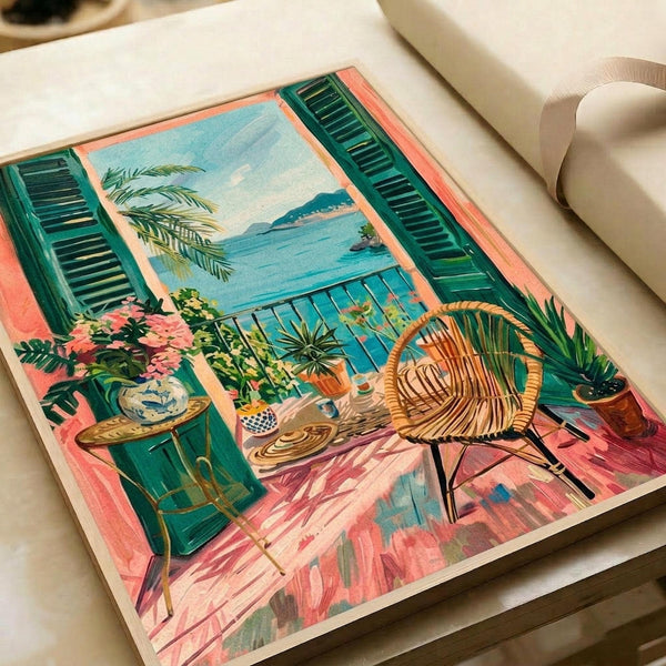 Mediterranean balcony scene with green shutters framing an ocean view. Wicker chair sits on coral pink tiled terrace with potted palm and flowering plants. Vintage travel poster style artwork in vibrant turquoise, coral, and green tones. Print displayed flat on white surface with neutral background and soft lighting.