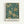 Ornate botanical pattern poster with golden flowers, leaves, and intricate floral motifs on deep teal background. Features detailed chrysanthemums, daisies, and flowing vine designs in cream and gold tones. Text at bottom reads "Morris & Company, 1866" and "William Morris" in black letters on white background. Displayed in thin natural wood frame against white wall.