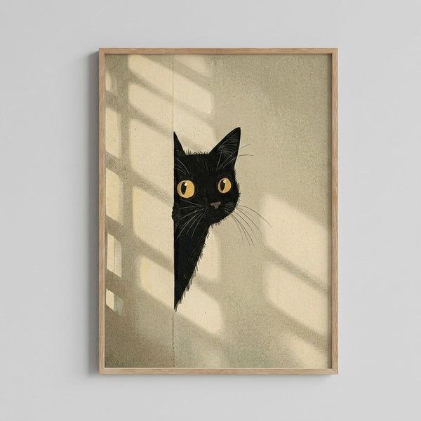 May include: Framed poster print hanging on white wall showing black cat with golden yellow eyes peeking around corner or doorway. Artwork features minimalist beige and cream color palette with geometric shadow patterns. Cat illustration shows detailed whiskers and alert expression. Natural wood frame with simple border. Soft lighting creates diagonal shadows across the wall surface.