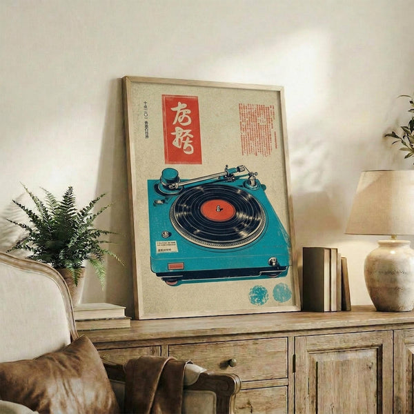 May include: Framed vintage-style poster featuring a turquoise record player with black vinyl and red label, displayed on rustic wooden sideboard alongside potted fern, ceramic vase, and stacked books in cozy living room with beige armchair and neutral walls
