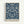 Ornate blue and cream botanical poster print featuring symmetrical floral damask pattern with sunflowers, grape clusters, and decorative leaves in William Morris Arts and Crafts style. The intricate design shows repeating motifs in deep navy blue against an off-white background, displayed in a simple light wood frame against a white wall.