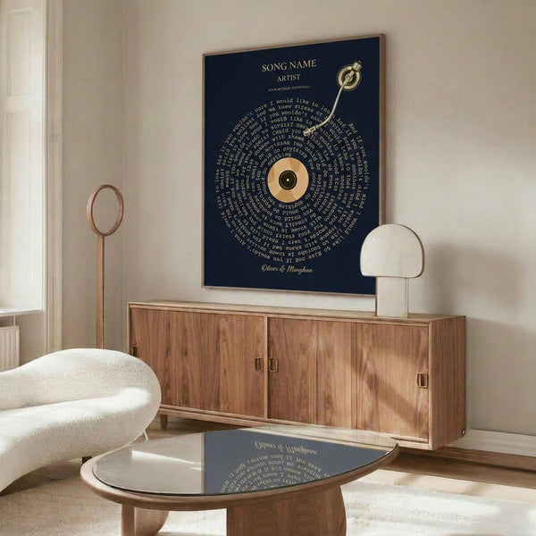 May include: Navy blue framed poster with spiral text design centered around golden vinyl record, displayed above wooden sideboard in modern living room with white curved chair, round glass coffee table, and cream colored lamp