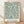 May include: Framed botanical print featuring teal blue willow branches and leaves on cream background in Arts and Crafts style, displayed in light wood frame against white textured wall on natural wood floor with soft shadows