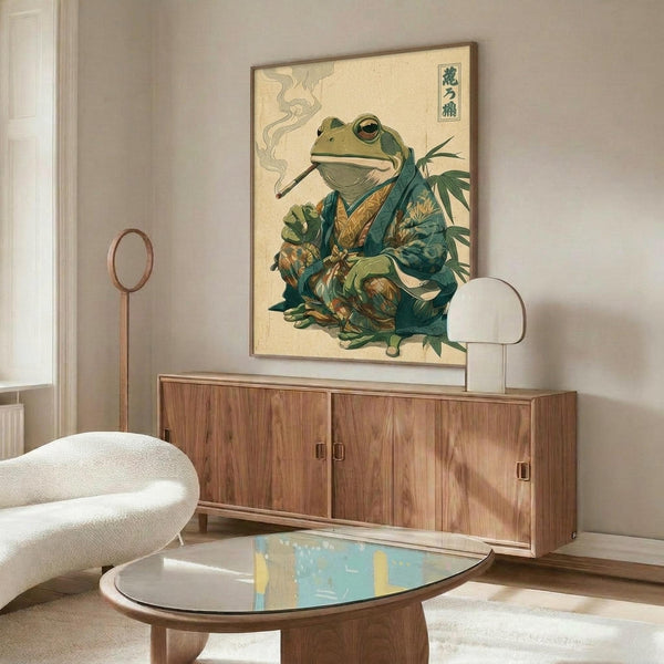 May include: Vintage-style Japanese woodblock print featuring a green frog in traditional blue and gold kimono smoking a long pipe, displayed in light wooden frame above mid-century walnut credenza with sliding doors. Modern white curved chair and glass-top oval coffee table complete the minimalist room setting with white walls and natural lighting.