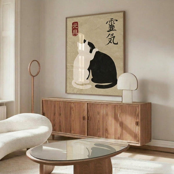 May include: Minimalist Japanese-style poster featuring black and white yin-yang cats with Asian characters and red seal stamp, displayed above a walnut wood credenza in modern living room with white sculptural chair, glass coffee table, and brass floor lamp