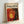 The image is a framed poster with a vibrant abstract painting on the cover.