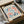 a framed poster of the Matisse painting "Papiers Découpes" (Paper Decoupes) in a cardboard box.