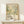 a framed poster of a floral design with the text "YAYOI KUSAMA" and "MUSEUM OF ART MODERNE PARIS" printed on it.