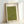 May include: Framed Japanese calligraphy art print with olive green textured background, featuring three simple black ink drawings of flying birds and vertical Japanese characters on the right side. The artwork is displayed in a light wood frame leaning against a white wall, showing the minimalist aesthetic and earthy green tone of the traditional-style poster.
