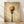 May include: Framed poster artwork showing a black fork with golden spaghetti noodles twirled around the tines against a vintage beige textured background, displayed in a light wood frame leaning against white walls on wooden flooring with natural sunlight casting soft shadows