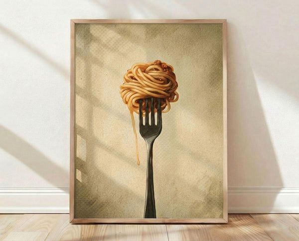 May include: Framed poster artwork showing a black fork with golden spaghetti noodles twirled around the tines against a vintage beige textured background, displayed in a light wood frame leaning against white walls on wooden flooring with natural sunlight casting soft shadows