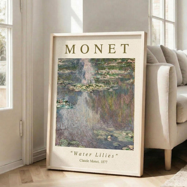 May include: Framed art print of Monet's Water Lilies painting displayed in bright living room with cream walls, beige sofa, and natural lighting. The poster features soft impressionist brushstrokes in muted greens, purples, and yellows depicting lily pads floating on reflective water. Text reads "MONET" at top and "Water Lilies Claude Monet, 1877" at bottom on cream background within light wooden frame.