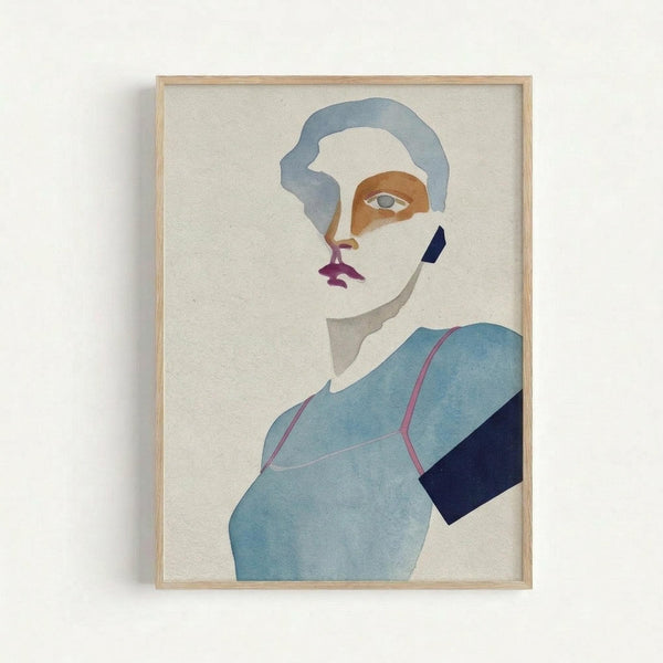 Minimalist portrait artwork featuring an abstract female figure with blue-gray hair and clothing. The stylized face shows geometric color blocking in muted tones - orange around one eye, purple lips, and a dark blue accent on the cheek. The figure wears a soft blue garment with pink trim details. The artwork uses watercolor-style painting on cream textured paper, displayed in a simple light wood frame against a white wall.